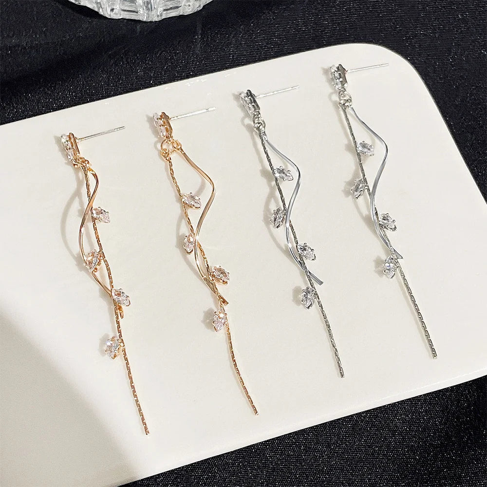 Moda coreana de luxo longo borla brincos para mulheres ins rotativa torcida zircão balançar brincos cor ouro jóias presente kde208